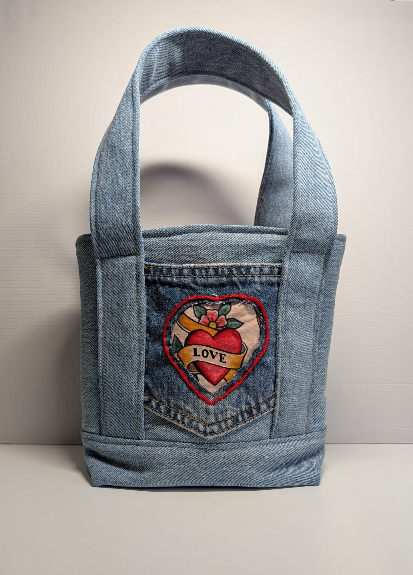 Denim Reworked small tote bag with tattoo style pocket and detachable crossbody strap