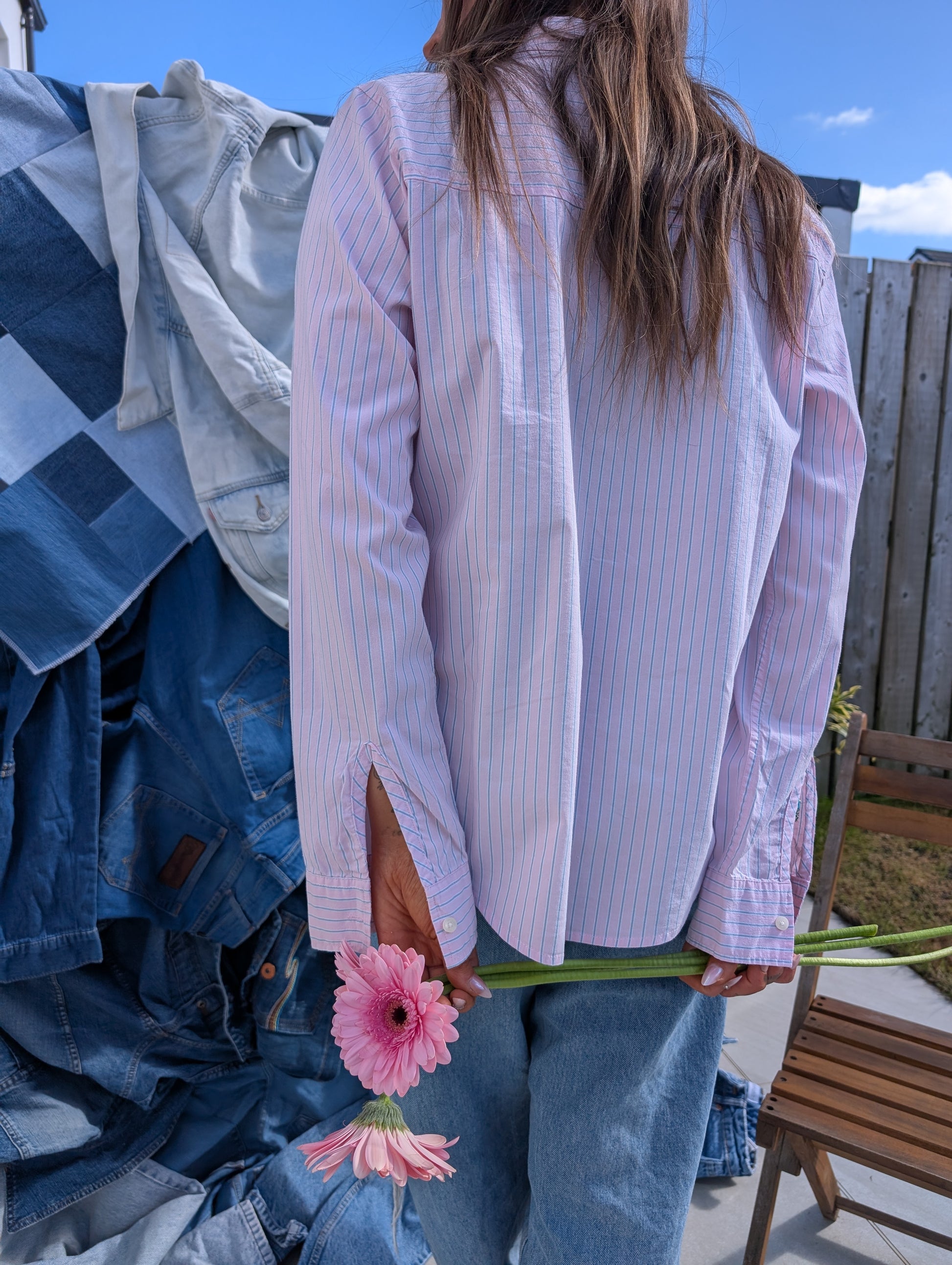 back view of reworked pink stripe crop shirt with long sleeves 