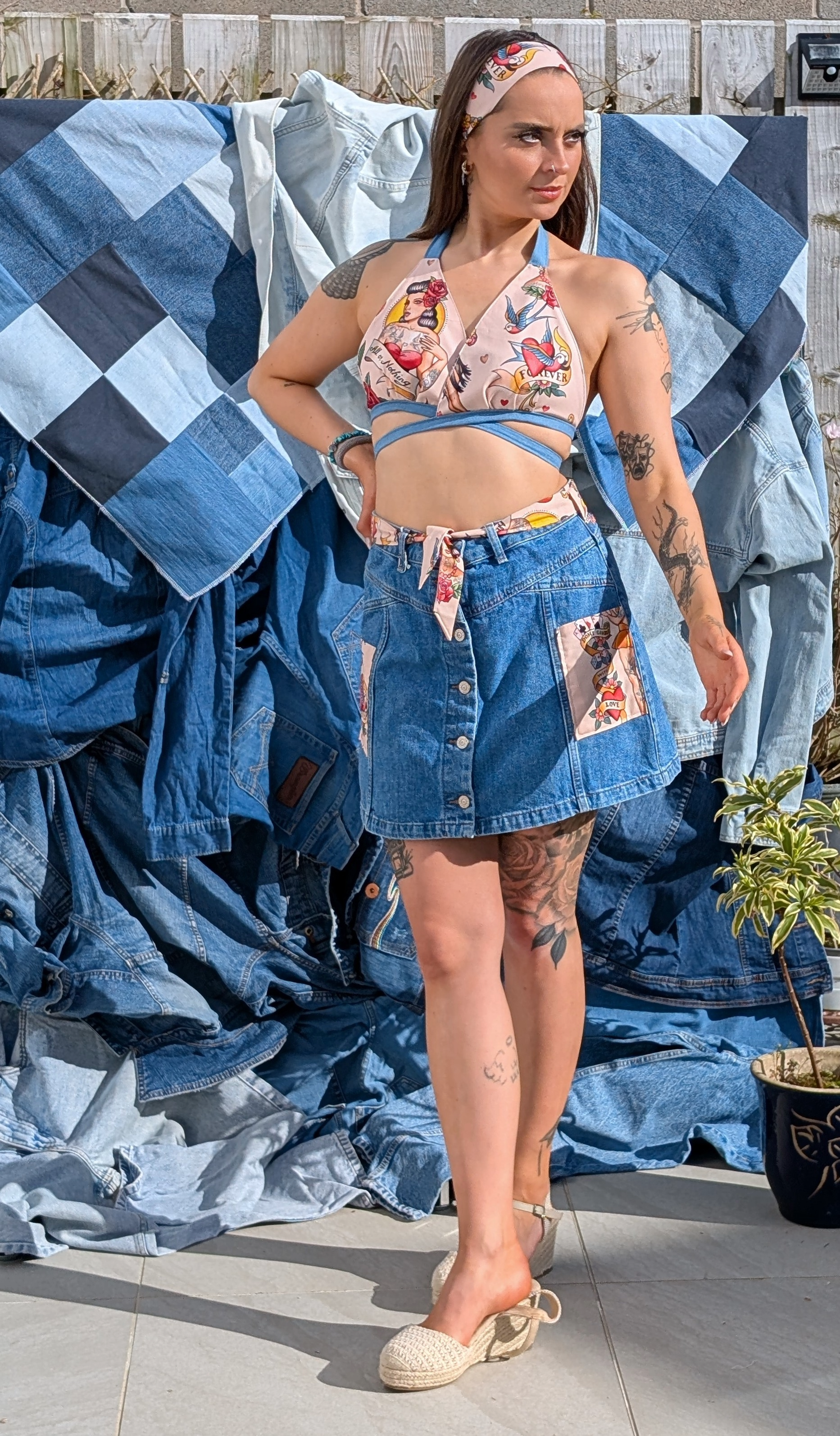 reworked high stakes denim skirt with tattoo inspired patchwork